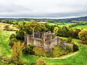 Autumn Colours over ruins of Grosmont Castle from a drone, Grosmont, Monmouthshire, Wales, UK