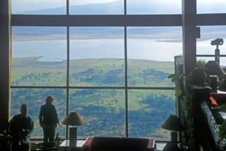 View through the panoramic window of the Ngorongoro Wildlife Lodge towards the Ngorongoro Crater,