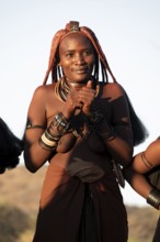 Himba woman dancing euphorically, traditional dance, traditional Himba village, Kaokoveld, Kunene,