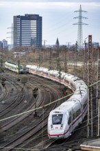 ICE train and S-Bahn on the route east, in front of Essen Central Station, regional traffic, City