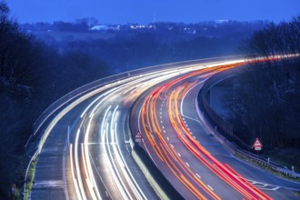 Evening traffic on the A52 motorway, between Düsseldorf and Essen, at the Ruhr Valley Bridge,