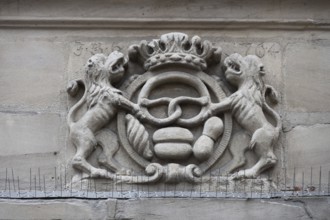 Old symbol of the bakery trade with crown, at a historic house, Nuremberg, Middle Franconia,