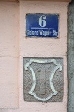 Relief of a knife, profession of a butcher, at the house from 1707, Richard Waghner-Str. 6.