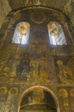Old wall paintings in a church depicting saints and religious symbols, Akhtala monastery, Akhtala