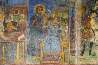 Historical fresco in a church depicting a Christian scene with detailed figures, Akhtala monastery,