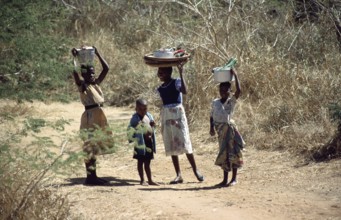 Girl with payloads, little boy, Malawi, Africa, June 2000, vintage, retro, old, historic