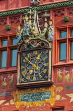 Exterior view of the magnificent clock at the Red Town Hall, Market Square, Basel