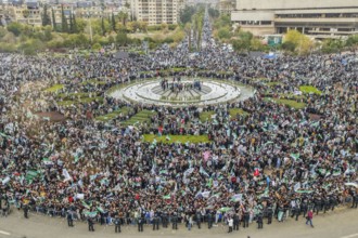 Damascus, Syria – December 08, 2025: A drone view shows thousands of people gathering in the iconic