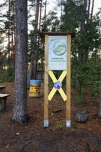 Information board in the forest addresses the final disposal of radioactive waste, solidarity with