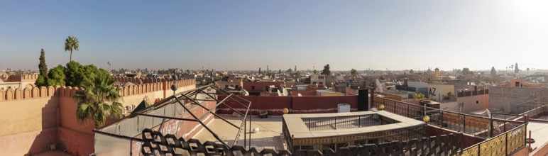 Extensive city view with low-rise buildings and blue sky, Morocco, Marrakech, panorama