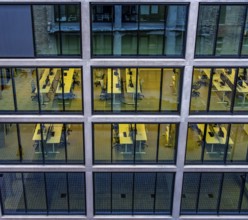 Desks with computers, workstations in an office complex on the former Tacheless, Berlin, Germany