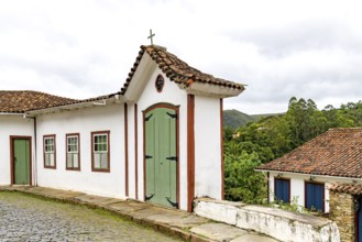 Old houses and chapel on the streets of the historic city of Ouro Preto, Ouro Preto, Minas Gerais,