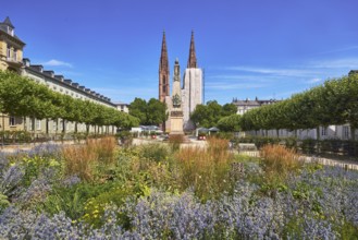 Park, flower bed, plants, Waterloo monument, St. Boniface Catholic Church, scaffolding, renovation,
