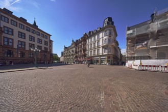 Historic buildings, old residential and commercial buildings, renovation, scaffolding, construction