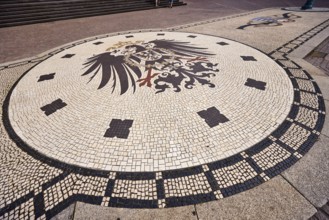 Square made of paving stones, mosaic imperial eagle of the German Empire, Schlossplatz square,