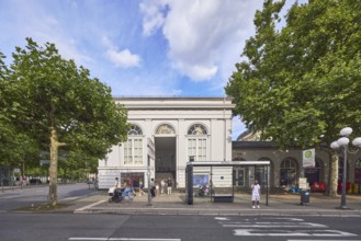 Spa hotel Theater bus stop, bus shelters, people waiting for means of transport, road marking BUS,