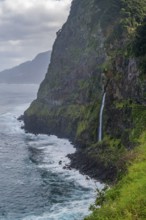 Waterfall flows into the sea, Miradouro do Véu da Noiva, Madeira, Portugal
