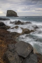 Rocky coast, volcanic rock formations, coast near Porto da Cruz, Madeira, Portugal