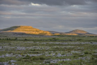 Sunset over the karst landscape of the Burren, Keelhilla, Carran, County Clare, Ireland