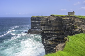 Cliff coast and observation post from World War II at Downpatrick Head, Lackan, County Mayo,