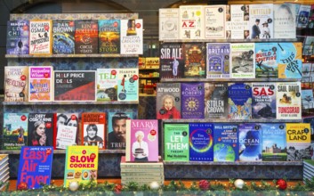 Books in window display of Waterstones bookshop, Ipswich, Suffolk, England, UK
