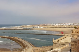 Coastal panorama with views of city, sea and fortified walls