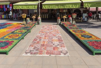 Geometric patterns of colorful flower petals on a marketplace