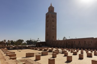 The Koutoubia Mosque in Marrakech with its tall minaret, surrounded by archaeological remains in