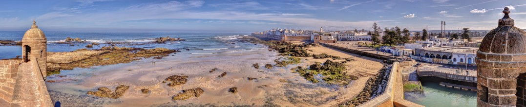 Panoramic view of a wide coastline and the sea with historic architecture