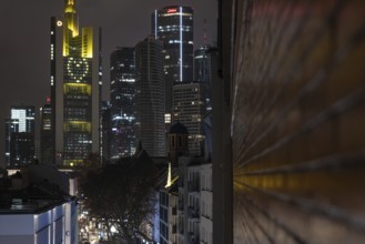 A yellow heart glows on the façade of the Commerzbank Tower in Frankfurt am Main at Christmas time