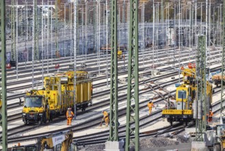 Rail construction crews with a work train. New parking station in Untertürkheim. As part of