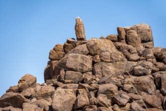 Round spherical rocks stacked into hills, Brandberg, Damaraland, Erongo, Namibia