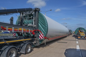 Heavy-duty transporter with a part of a wind turbine, at a motorway rest area of the A9,