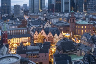 The lights of the Frankfurt Christmas market are shining on the Römerberg in downtown Frankfurt am