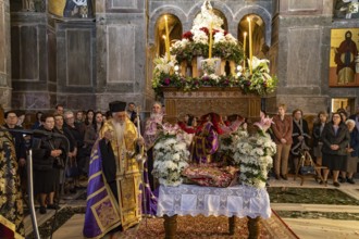 Orthodox priests at Epitaphios at Mass on Good Friday in the Catholicon of the Hosios Luke