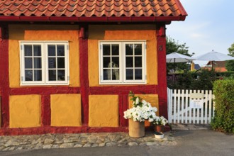 Typical colorful half-timbered house, Gudhjem, Bornholm, Baltic Sea, Denmark