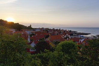 View of Gudhjem, view over the roofs of the Baltic Sea, sunset, sunbeams, Gudhjem, Bornholm, Baltic