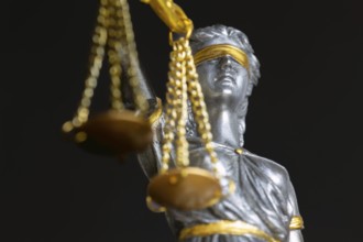 Close-up of justice as a symbol of court rulings, case law, justice, etc