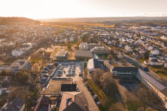 Wide aerial view of a village at sunset with roads and houses, Althengstett, Calw district, Germany