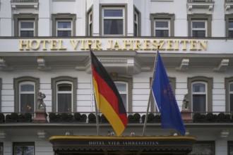 Façade of Hotel Vier Jahreszeiten, German flag, Hamburg, Free and Hanseatic City of Hamburg,