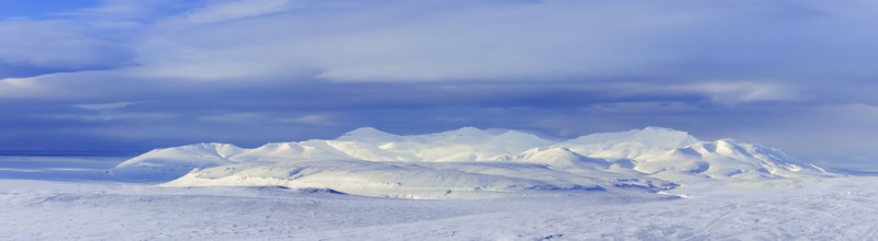 Snow covered mountains in Arctic landscape at Mohnbukta, bay at the western shore of Storfjorden in