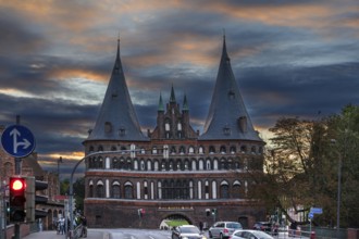 Holstentor, historic city gate from 1478, in the evening, Holstentorplatz, Hanseatic City of