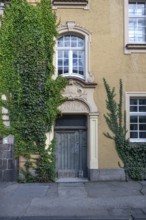 Stucco decoration above the entrance to Johanneum, built in 1905, near St. Johannis 1-3, Hanseatic