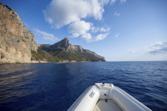 Motorboat trip along the picturesque rocky coast, cliffs and blue sea, Golfo di Orosei, Baunei,