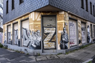Street art in Essen, graffiti on an empty building on Varnhorststraße, city center, North