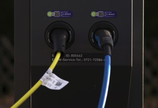 Detailed view, parking lot with gas pump, EnBW charging station for electric cars, charging