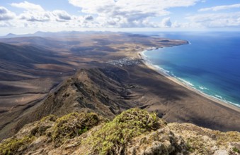 Castillejo viewpoint, view from the Risco de Famara cliffs to the coast and the sea with Famara