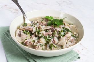 Muzhuzhi, a Georgian dish made from pork legs, with spices and herbs, homemade