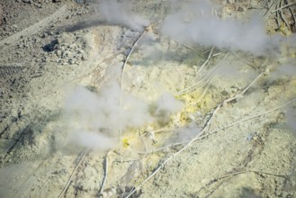 Steaming fumaroles in the Owakudani geothermal area at Komagatake volcano, Hakone, Japan