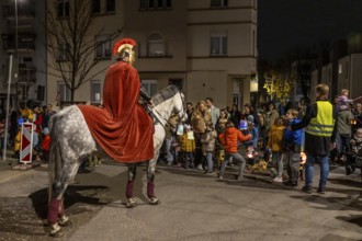Martinszug in Essen-Rüttenscheid, the parish of St. Lambertus, Saint Martin actor on a horse, with